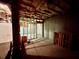 Unfinished basement area showing exposed rafters and wall framing, ready for build-out at 25 Derby Dr, Hiram, GA 30141