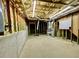 Unfinished basement with exposed utilities, offering potential for a customized space at 25 Derby Dr, Hiram, GA 30141