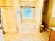 Bathroom featuring a tub and shower at 25 Derby Dr, Hiram, GA 30141