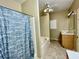Bathroom featuring a tub with shower and fan at 25 Derby Dr, Hiram, GA 30141