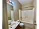 Bathroom featuring a shower-tub combo, vanity and tile flooring at 25 Derby Dr, Hiram, GA 30141