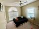 Bedroom featuring a bed, two windows with blinds, and neutral paint at 25 Derby Dr, Hiram, GA 30141