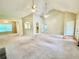 Open living room showcasing a fireplace, arched doorways, and kitchen view at 25 Derby Dr, Hiram, GA 30141
