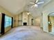 Open living room with fireplace, built-in shelving, and neutral color scheme at 25 Derby Dr, Hiram, GA 30141