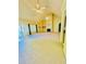 Open-concept living room with high ceilings, a fireplace, and sliding glass doors to the outside at 25 Derby Dr, Hiram, GA 30141