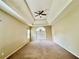 The spacious main bedroom features a ceiling fan and a large window at 25 Derby Dr, Hiram, GA 30141