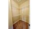 Walk-in closet equipped with white wire shelving for organized storage and efficient use of space at 25 Derby Dr, Hiram, GA 30141