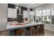 Modern kitchen with stainless appliances, sleek countertops, and stylish bar stools at 711 Needletail Way, Atlanta, GA 30312