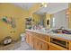 Well lit bathroom featuring a large countertop, sink, toilet and decorative fixtures at 1230 Brook Meadow Ct, Lawrenceville, GA 30045