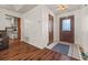 Inviting entryway features tiled floors and a decorative glass front door at 1230 Brook Meadow Ct, Lawrenceville, GA 30045