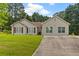 Charming single-story home with well-maintained lawn and a concrete driveway at 1230 Brook Meadow Ct, Lawrenceville, GA 30045