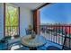Charming balcony with table and seating offers a cozy outdoor retreat at 1133 Church St # 6, Covington, GA 30014