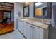Modern bathroom with double sinks, ample counter space, and a clean, minimalist design with overhead natural wood at 1133 Church St # 6, Covington, GA 30014