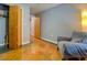 Neutral bedroom space offering ample storage and potential seating area at 1133 Church St # 6, Covington, GA 30014
