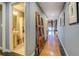 Hallway view with bathroom on left and an open loft space at the end of the hall at 1133 Church St # 6, Covington, GA 30014