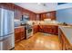Well-equipped kitchen features stainless steel appliances and dark wood cabinetry at 1133 Church St # 6, Covington, GA 30014