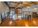 Loft-style living area featuring a sleek railing, exposed ductwork, and abundant natural light with polished floors at 1133 Church St # 6, Covington, GA 30014