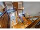 Loft view overlooking the dining and living areas with exposed brick and high ceilings at 1133 Church St # 6, Covington, GA 30014