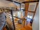 Loft view showcasing the open floor plan, staircase, and exposed brick details at 1133 Church St # 6, Covington, GA 30014