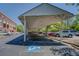 Ample parking under covered structure with dedicated accessible space at 1133 Church St # 6, Covington, GA 30014