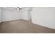 Spacious bedroom featuring neutral carpet, a ceiling fan, and ample natural light at 125 Auburn Gate Ln, Auburn, GA 30011