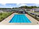 A large community swimming pool provides a refreshing and recreational amenity for residents to enjoy at 125 Auburn Gate Ln, Auburn, GA 30011