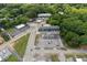 Aerial shot of townhouses surrounded by lush green landscaping in a suburban area at 1570 Flat Shoals Se Rd # 7, Atlanta, GA 30316