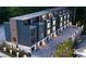 Stunning modern townhome exterior featuring a rooftop terrace and private garage at 1570 Flat Shoals Se Rd # 7, Atlanta, GA 30316