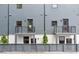 Modern townhouse with private balconies and well-maintained fencing at 1570 Flat Shoals Se Rd # 7, Atlanta, GA 30316