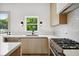 The kitchen boasts stone countertops, stainless appliances and opens to the outside at 1570 Flat Shoals Se Rd # 7, Atlanta, GA 30316