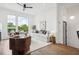 Bright living room featuring a ceiling fan, comfortable seating, and large windows at 1570 Flat Shoals Se Rd # 7, Atlanta, GA 30316