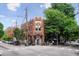 Street view highlighting a brick building with outdoor cafe seating and nearby shops at 1570 Flat Shoals Se Rd # 7, Atlanta, GA 30316