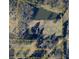 Aerial view of property with pond and ample land in a wooded area on New Hope Cir at 177 New Hope Cir, Fayetteville, GA 30214