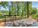 Wooden deck overlooks landscaped backyard surrounded by mature trees at 2302 Aurie Dr, Decatur, GA 30034