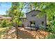 Exterior back view of home showing deck, patio, and backyard at 2302 Aurie Dr, Decatur, GA 30034