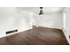 Bright living room features sleek, dark floors, modern lighting, and fresh white walls at 2302 Aurie Dr, Decatur, GA 30034
