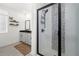 Modern bathroom features a glass-enclosed shower with decorative tile and a stylish vanity with ample storage at 383 Pratt Se Dr # 506, Atlanta, GA 30315