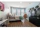 Whimsical bedroom with wood floors, natural light, and cozy decor perfect for relaxation at 383 Pratt Se Dr # 506, Atlanta, GA 30315