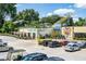 Bright exterior view of Elsewhere Brewing with colorful murals and ample parking spaces at 383 Pratt Se Dr # 506, Atlanta, GA 30315