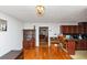 Inviting living room with beautiful hardwood floors and access to the kitchen at 9186 Puckett St, Covington, GA 30014