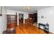Inviting living room with beautiful hardwood floors and access to the kitchen at 9186 Puckett St, Covington, GA 30014