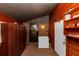 Large mud room with exterior access and additional freezer storage at 9186 Puckett St, Covington, GA 30014