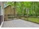 Expansive back deck with gray wood, perfect for outdoor relaxation and entertaining at 1520 N Milford Creek Sw Ln, Marietta, GA 30008