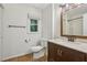 Bathroom featuring a vanity with a marble countertop and a shower/tub combination at 1520 N Milford Creek Sw Ln, Marietta, GA 30008