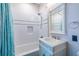 Elegant bathroom showcasing subway tile, a shower-tub combo, and a stylish vanity at 333 Mimosa Dr, Decatur, GA 30030