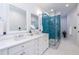 Elegant bathroom features dual vanity, soaking tub, and glass enclosed shower at 333 Mimosa Dr, Decatur, GA 30030