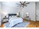 Spacious bedroom boasts vaulted ceiling, large fan, and neutral decor at 333 Mimosa Dr, Decatur, GA 30030