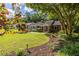 Charming brick home featuring a well-manicured lawn and beautiful landscaping for a welcoming appeal at 333 Mimosa Dr, Decatur, GA 30030