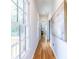 Bright hallway features hardwood flooring, crisp white trim, and natural light from large windows at 333 Mimosa Dr, Decatur, GA 30030
