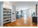 Open-concept home showcasing hardwood floors, built-in shelves, and a modern kitchen at 333 Mimosa Dr, Decatur, GA 30030